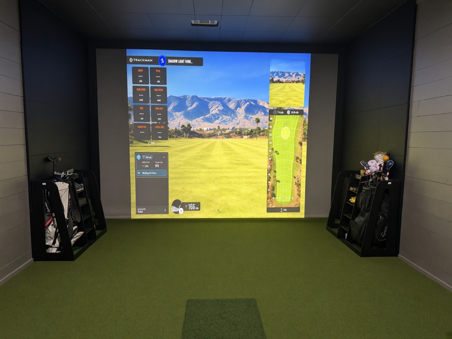 The indoor bay: TrackMan waiting for a shot, 166 yards to the pin